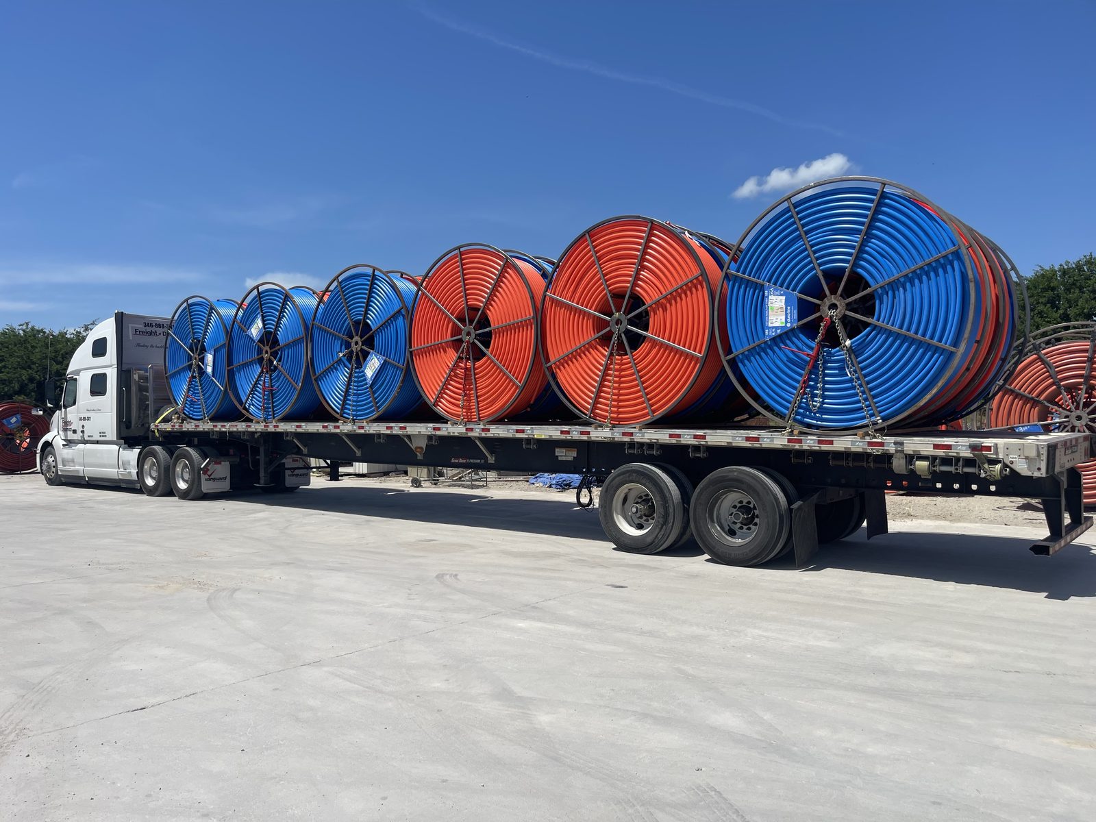 Secured conduit reels ready for transport