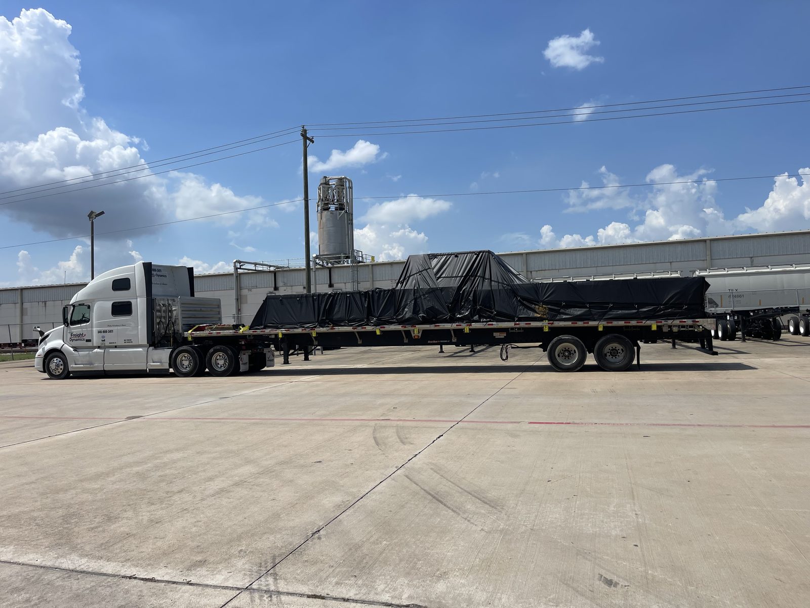 Tarped and secured flatbed load