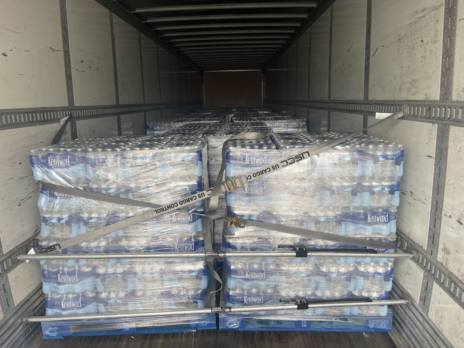 Palletized freight strapped inside dry van