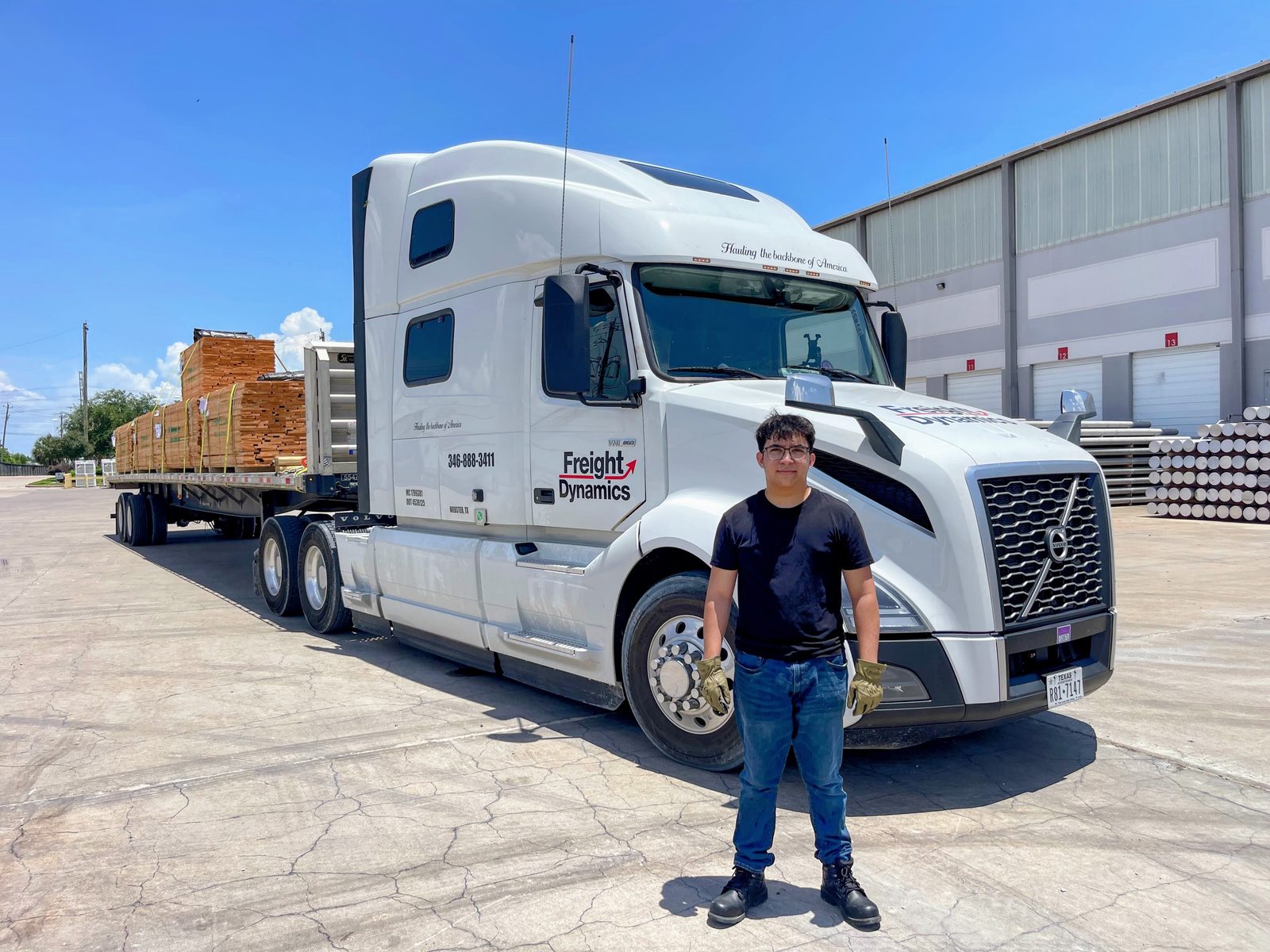 Freight Dynamics driver with company truck
